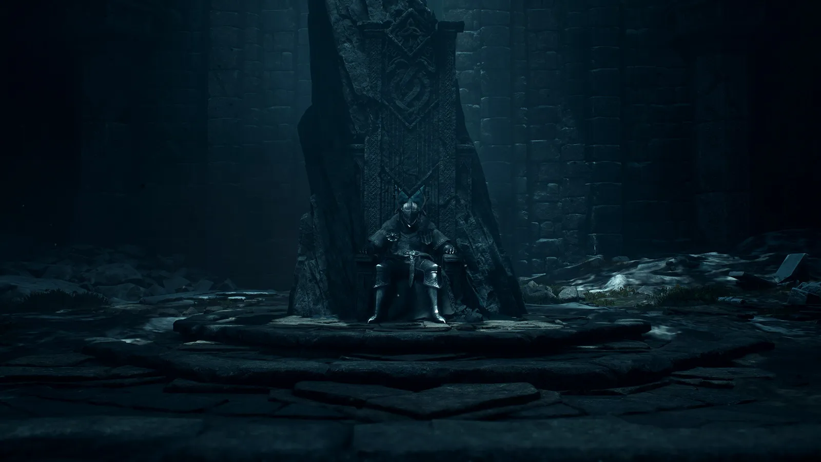 Two figures standing inside a candlelit stone chamber